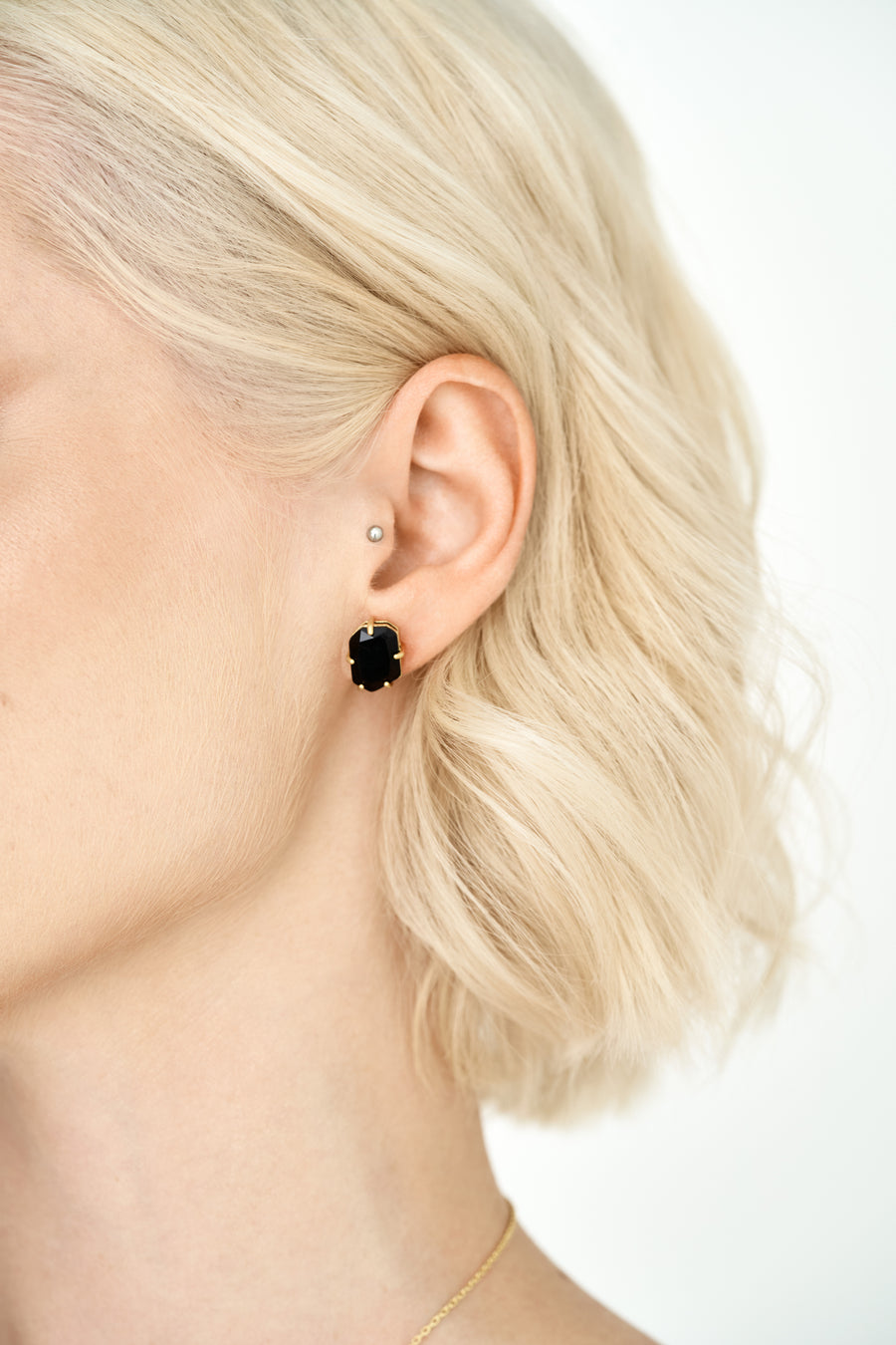 Black onyx pentagon 14K stud earrings